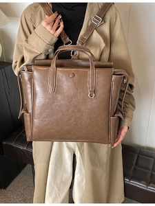Retro brown large capacity backpack with white stitching and dual handle for women