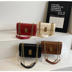 Quilted leather shoulder bags in burgundy, cream, black and brown with gold chain straps