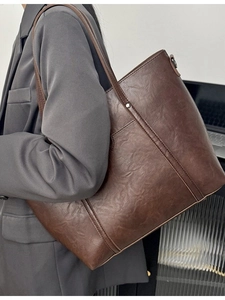 Retro dark brown large tote bag with textured finish and exterior pocket for daily work