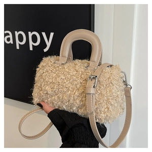 Detailed macro view of beige curly faux fur texture and leather handles on mini bag