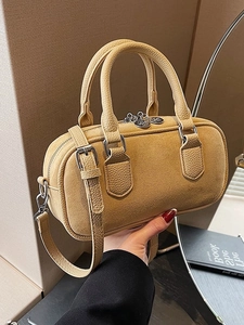 Schicke senfgelbe Boston Bag aus strukturiertem Leder und Wildleder mit Gurt