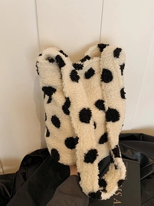 Plush lamb wool tote bag with black polka dots and wide shoulder strap for women