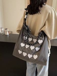 Large dark grey nylon tote bag with heart embroidery and braided shoulder strap