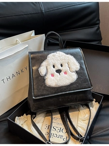 Retro black leather backpack with cute plush cartoon puppy patch and top handle
