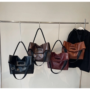 Minimalist faux leather tote bags in four colors with twisted rope shoulder straps