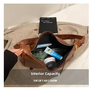 Interior view showing the large storage capacity of the brown vintage leather hobo bag