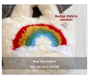 Detail of white plush shoulder bag with rainbow pattern and cute bunny badge detail