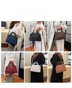 Detailed look at various colors of quilted shell tote bag shown in handheld and shoulder styles