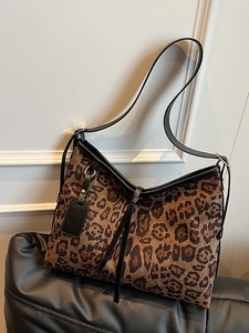 Sac fourre-tout rétro à motif léopard avec bordures noires et longues bandoulières