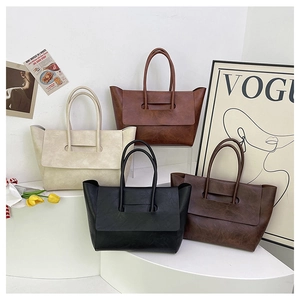 Detailed collection of vintage large tote bags in beige, tan, black, and brown faux leather