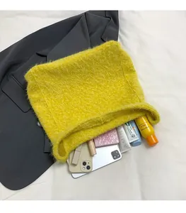 Top view of yellow fuzzy tote bag interior showing large capacity for daily essentials