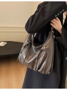 Large dark brown faux leather tote bag with vintage texture and zipper detail