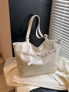 White large capacity tote bag with decorative metal buckle and textured leather finish
