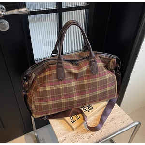 Sac de voyage à carreaux classique avec poignées en cuir marron et bandoulière tissée