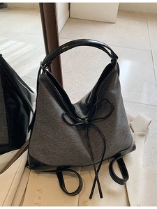 Minimalist large tote bag with grey felt fabric and black leather contrast and bow detail