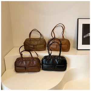 Detailed display of four retro minimalist shoulder bags in black, brown, tan, and olive green
