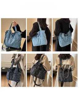 Model wearing large denim tote bag in light blue and dark gray showing crossbody style