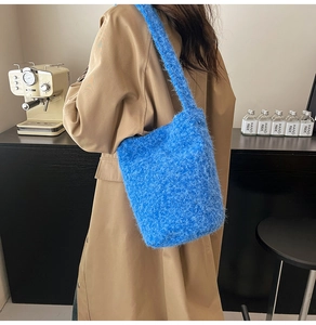Blue faux fur tote bag detail showing the soft plush texture and large capacity style