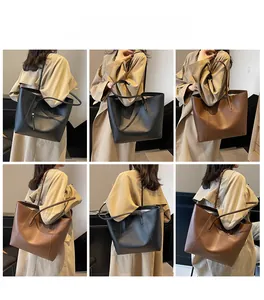 Minimalist large tote bag showing size scale and shoulder fit on female model