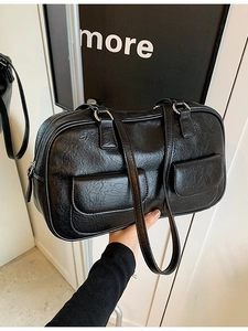Retro black faux leather handbag with pleated texture and two front flap pockets