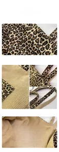 Detail of leopard print canvas tote bag featuring reinforced stitching and inner pocket
