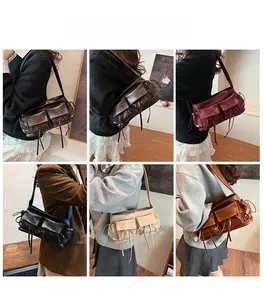 Detailed view of versatile shoulder bags with double flap pockets and tassel drawstrings