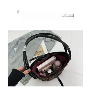 Top view of large capacity leopard print bucket bag showing spacious inner storage