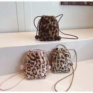 Plush leopard print mini bucket bag with drawstring closure in three stylish colors
