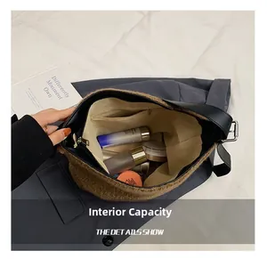 Macro view of the large capacity interior with zipper pocket and wool lining