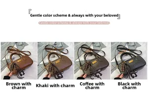 Detail view of retro Boston bags in brown, khaki and black with cute pendants