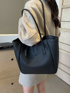 Minimalist black lychee texture leather tote bag with large capacity for women