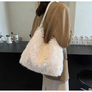Detail of plush faux fur tote bag with long soft texture and slim shoulder straps