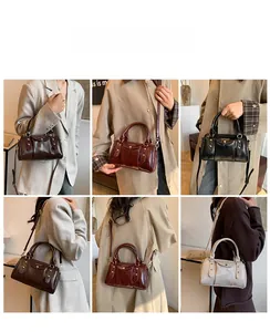 Boston style crossbody bag with rivet details shown in various carrying options