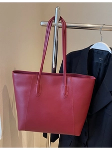 Minimalist red leather tote bag with long straps for women's autumn commute