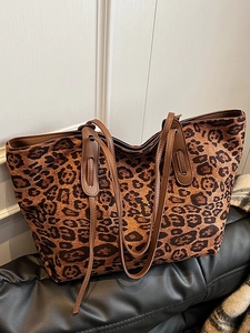 Large leopard print tote bag with brown faux leather handles for stylish casual commuting