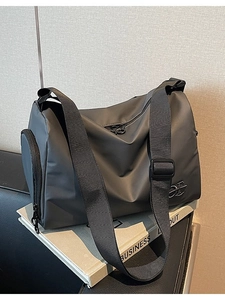 Sac à bandoulière cylindrique gris foncé imperméable avec sangle réglable pour sport et bureau