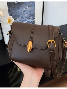 Retro deep brown crossbody bag with matte PU leather and a golden oval metal lock clasp