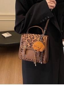 Large capacity leopard print crossbody bag with plush puppy pendant for trendy women