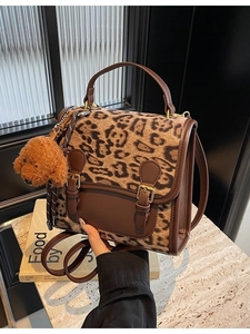 Large shoulder bag with vintage brown leather and leopard print patchwork design