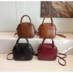 Detailed collection of vintage textured mini crossbody bags in four retro colors