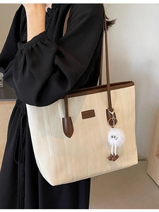 Women Large Capacity Ripple Texture Tote Bag With Contrast Color Handles And Plush Charm Fashion Commuter Shoulder Bag