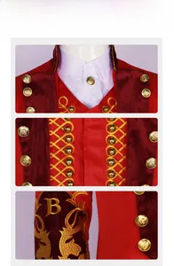 Detail of red circus costume with golden embroidery, metal buttons and letter B embroidery
