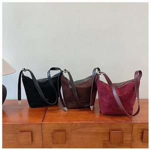 Three minimalist large capacity soft PU leather tote bags in black, brown and burgundy