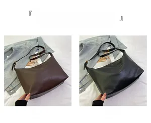 Minimalist leather tote bag in coffee and black colors with adjustable shoulder straps