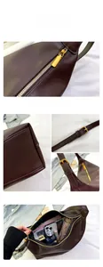 Detail showing high-capacity coffee brown hobo bag with gold zipper and spacious interior