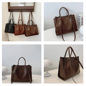 Detailed view of high-capacity tote bags in black, brown and dark coffee synthetic leather