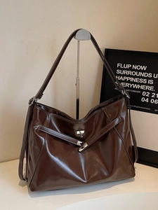 Retro brown glossy leather hobo tote bag with silver buckle and contrast stitching