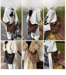 Detailed views of leopard print hobo bucket bag with leather strap and plush charms