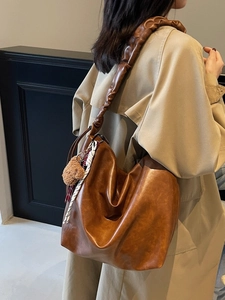 Vintage caramel brown large capacity tote bag with bear charm and scarf on model