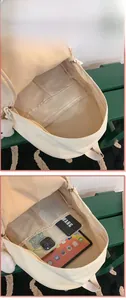 Internal layout of minimalist school backpack showing compartments and storage capacity
